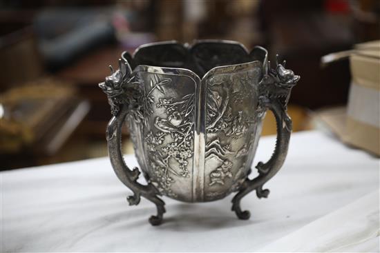 A late 19th/early 20th century Chinese Export silver small jardinere, on three dragon handle supports by Wang Hing, Hong Kong.